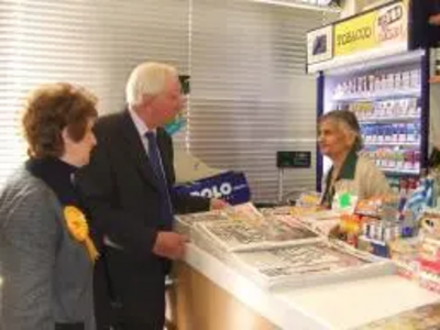 Lord Cotter and Rosie talk to Mrs Sood about her business.