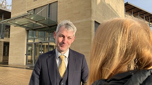 Will Forster outside Surrey County Council 