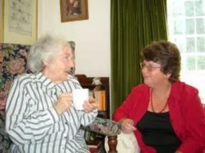 Dr Anne Lee discussing the needs of older people with Elisabeth Elton, a Woking resident, Elderly, old