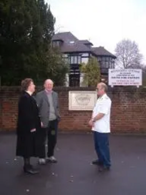 Anne with Barry Liddle and Mick Young outside Kettlewell Hill Nursing Home