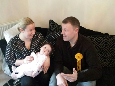 Parliamentary Candidate for Woking, Chris Took, discussing Lib Dem childcare plans with new mum Lisa (and Maya-Lily)