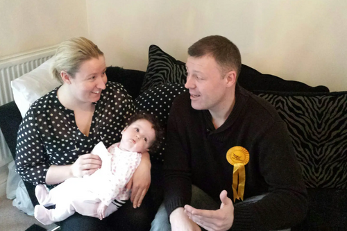 Parliamentary Candidate for Woking, Chris Took, discussing Lib Dem childcare plans with new mum Lisa (and Maya-Lily)