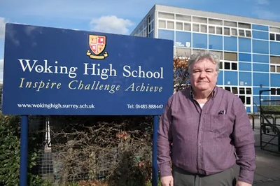 John Doran outside Woking High School