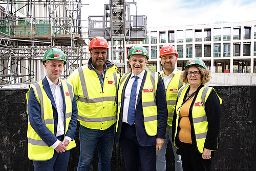 Will Forster, Ed Davey, and Ann-Marie Barker at Sheerwater 