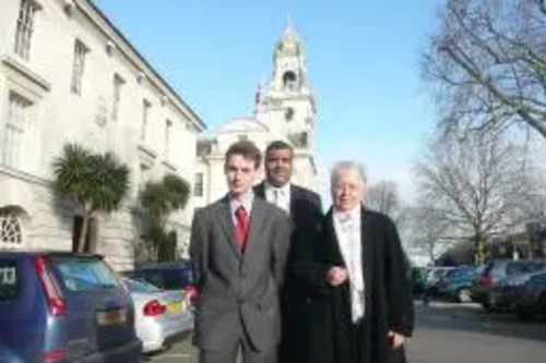 Woking County Councillors Diana Smith, Mohammed Amin, and Will Forster at County Hall